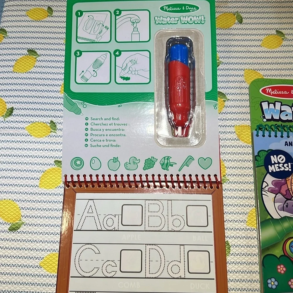 Melissa and Doug Water Wow and Write and Wipe books and dr. Seuss writing paper